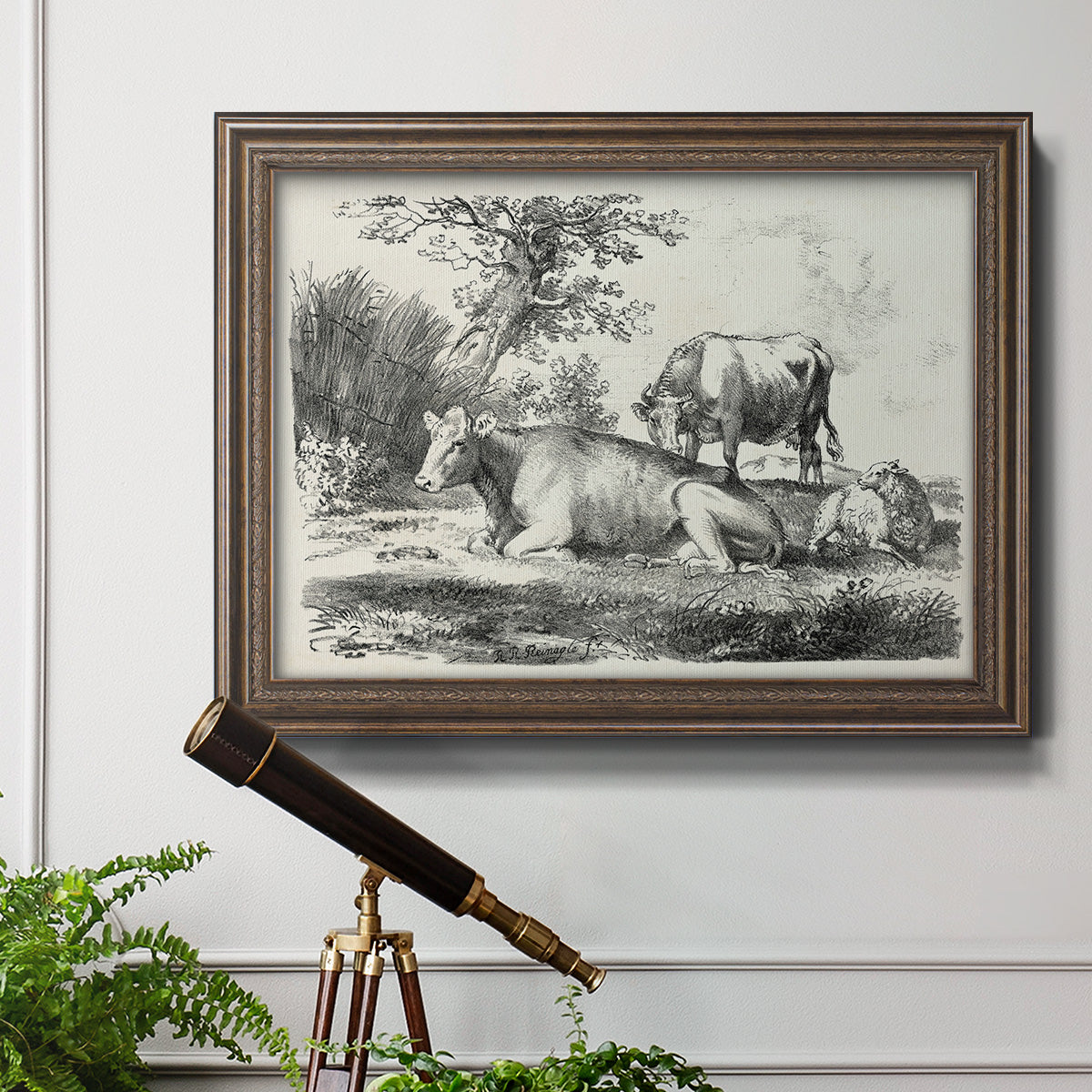 Classical pastoral landscape artwork by Nicolas Berchem in an ornate traditional bronze frame displayed in a light-toned interior setting.
