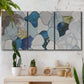 Three-panel canvas wall art featuring mid century geometric pink abstraction, displayed in a boho-chic entryway above a console table.