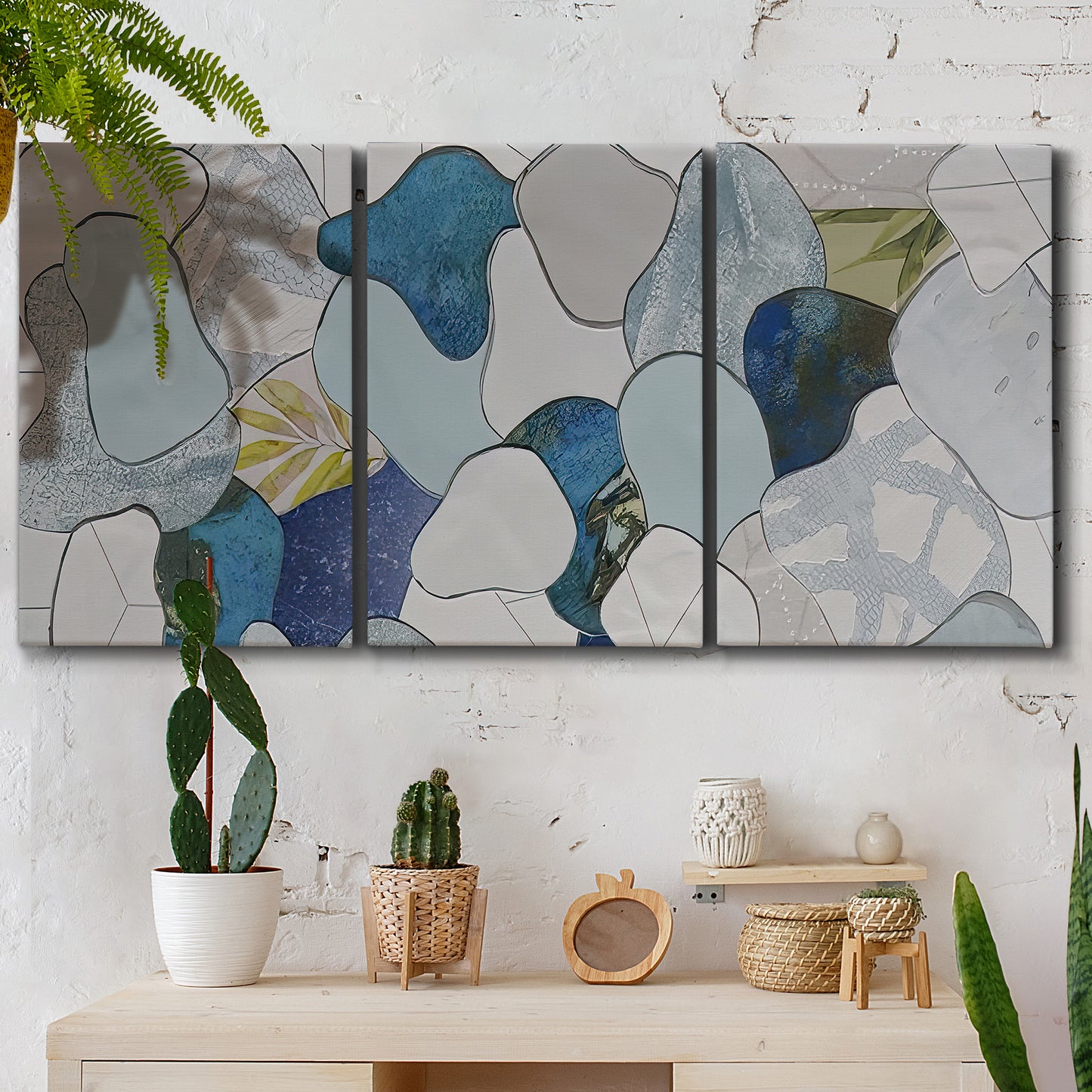 Three-panel canvas wall art featuring mid century geometric pink abstraction, displayed in a boho-chic entryway above a console table.