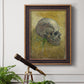 Profile skull study artwork by Vincent van Gogh in an ornate bronzed mahogany wood frame displayed in a light-toned interior setting.