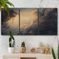 Three-panel canvas wall art featuring surreal floating figures above landscape, displayed in a boho-chic entryway above a console table.