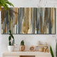 Three-panel canvas wall art featuring abstract vertical illusion pattern, displayed in a boho-chic entryway above a console table.
