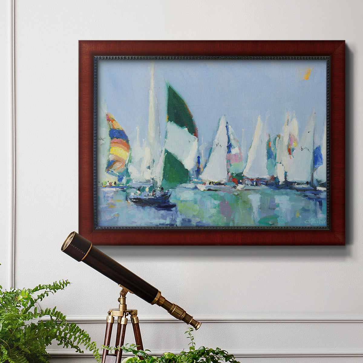 Coastal harbor watercolor painting in an ornate cherry burl wood frame displayed in a light-toned interior setting.
