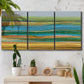 Three-panel canvas wall art featuring parallel linear abstract striations, displayed in a boho-chic entryway above a console table.