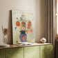 Canvas art print of a stylized arrangement with blooms and muted tones styled in a home decor setting.