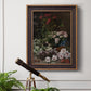 Early impressionist floral painting by Claude Monet in an ornate bronzed mahogany wood frame displayed in a light-toned interior setting.