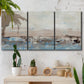 Three-panel canvas wall art featuring abstract bridge landscape in cyan, displayed in a boho-chic entryway above a console table.