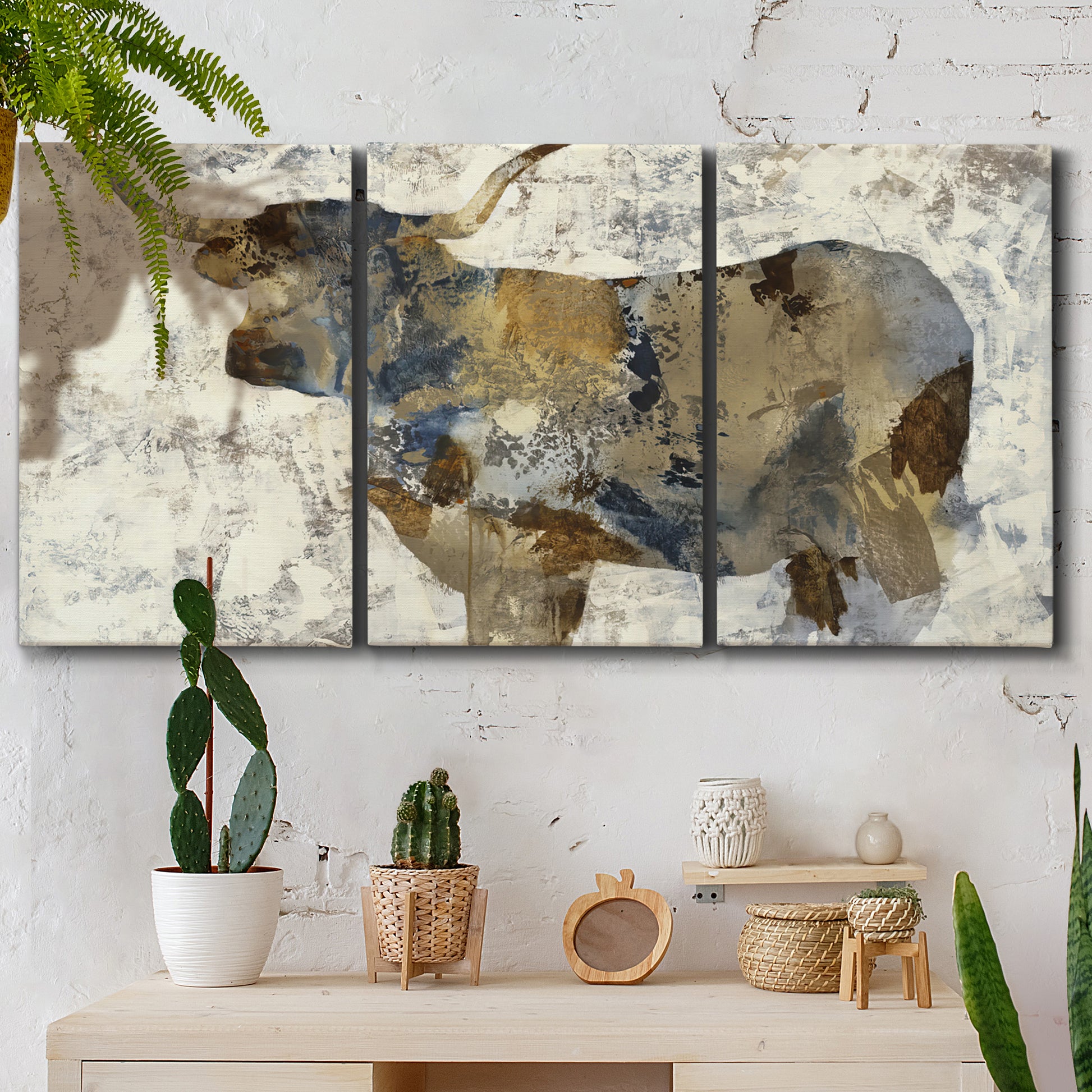 Three-panel canvas wall art featuring farm animal portrait in rustic setting, displayed in a boho-chic entryway above a console table.