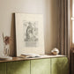 Canvas art print of a classical figure with etched detail and simple background styled in a home decor setting.