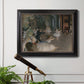 Impressionist backstage ballet scene by Edgar Degas in an ornate black frame with gilded inner detail displayed in a light-toned interior setting.