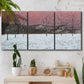 Three-panel canvas wall art featuring winter sunset snowfall landscape, displayed in a boho-chic entryway above a console table.