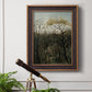 Dreamlike forest landscape scene by Henri Rousseau in an ornate bronzed mahogany wood frame displayed in a light-toned interior setting.