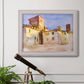 Impressionist Italian village scene by John Singer Sargent in an ornate weathered white frame displayed in a light-toned interior setting.