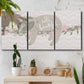 Three-panel canvas wall art featuring sloth with floral decorative elements, displayed in a boho-chic entryway above a console table.