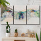 Three-panel canvas wall art featuring abstract mountain range watercolor, displayed in a boho-chic entryway above a console table.