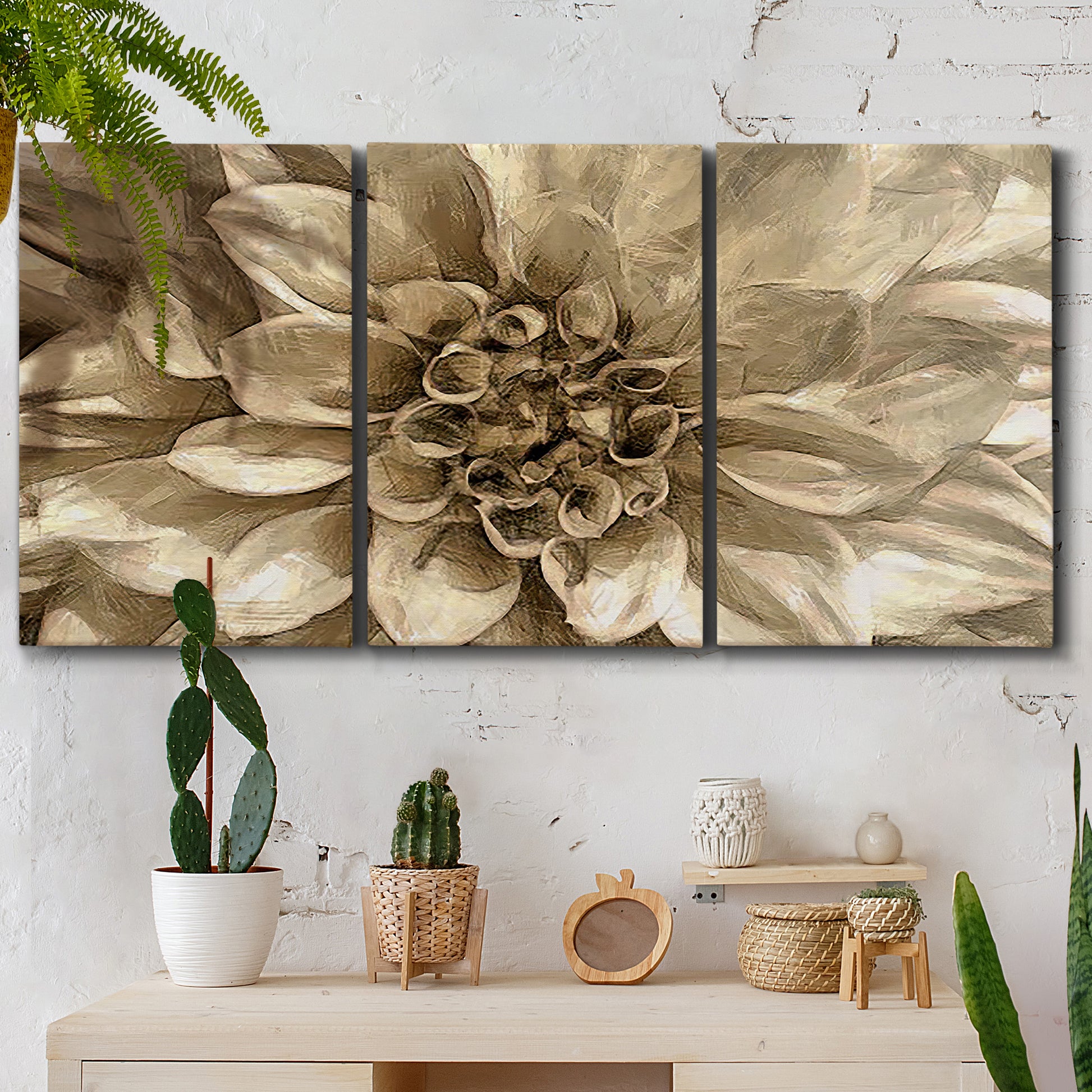 Three-panel canvas wall art featuring monochrome floral linework composition, displayed in a boho-chic entryway above a console table.
