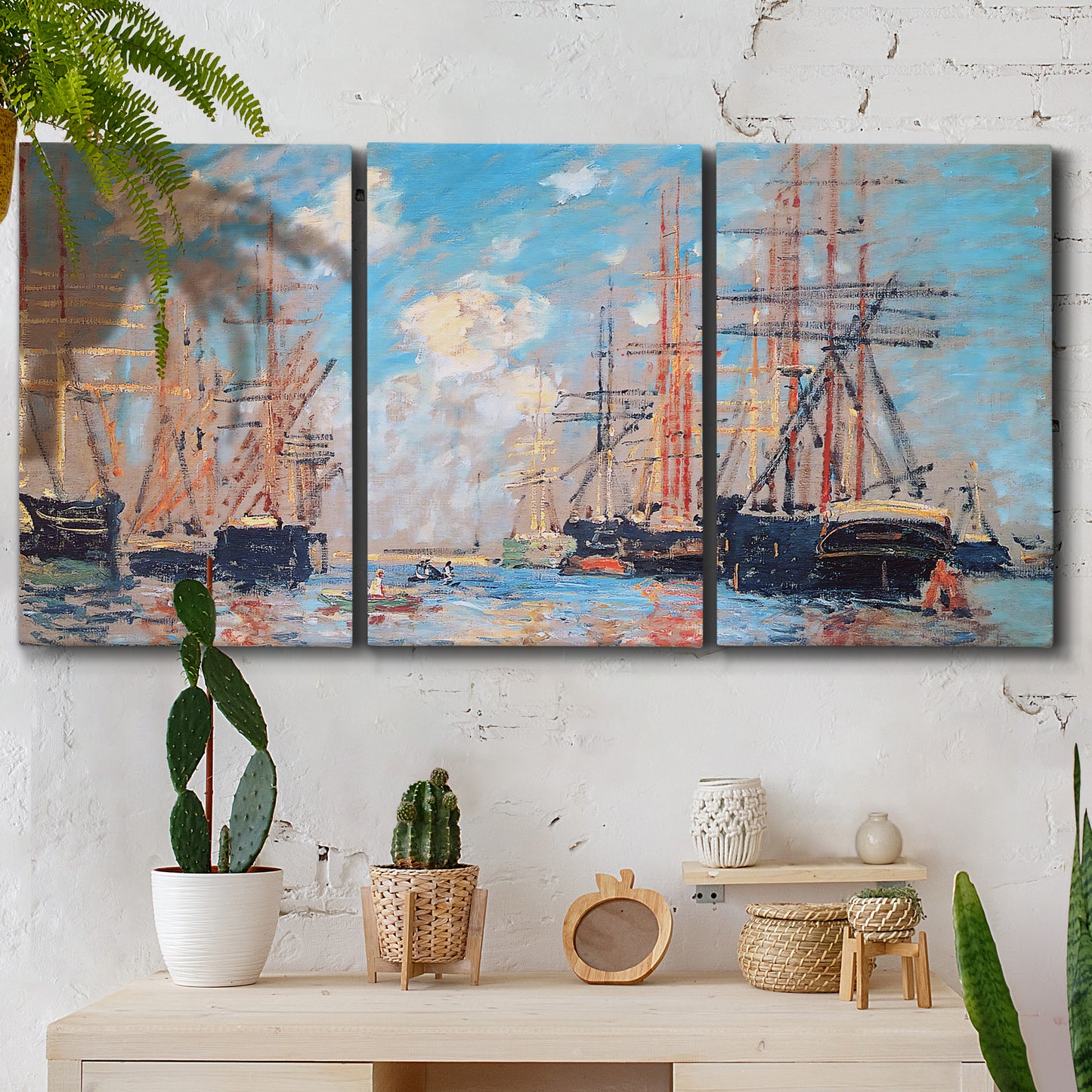 Three-panel canvas wall art featuring harbor with boats and water, displayed in a boho-chic entryway above a console table.