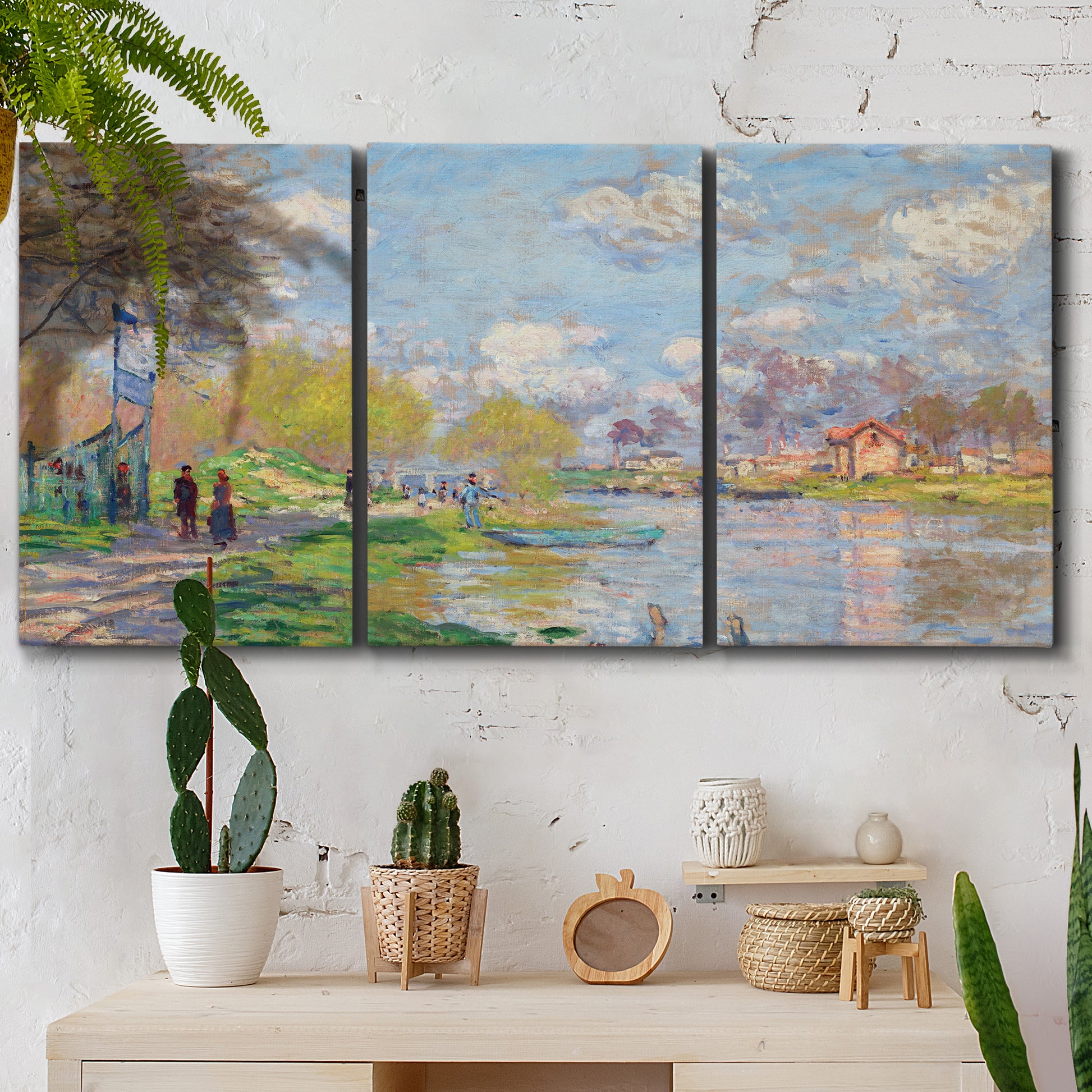 Three-panel canvas wall art featuring formal city park with trees, displayed in a boho-chic entryway above a console table.