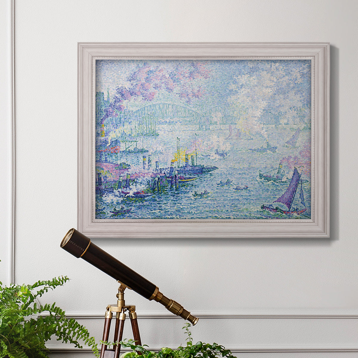 Impressionist industrial harbor scene by Paul Signac in an ornate weathered white frame displayed in a light-toned interior setting.