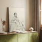 Canvas art print of a refined male figure with minimal shading and soft lines styled in a home decor setting.