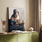 Canvas art print of a focused figure working with fine thread in soft light styled in a home decor setting.