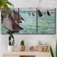 Three-panel canvas wall art featuring sailboat regatta near coastal village, displayed in a boho-chic entryway above a console table.