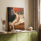 Canvas art print of a classical figure posed with flowing fabric and warm tones styled in a home decor setting.