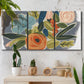 Three-panel canvas wall art featuring colorful botanical illustration, displayed in a boho-chic entryway above a console table.