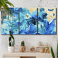 Three-panel canvas wall art featuring abstract coastal beach color fields, displayed in a boho-chic entryway above a console table.