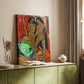 Canvas art print of a bold composition with simplified figures and contrasting tones styled in a home decor setting.