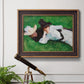 Impressionist outdoor portrait of two girls by John Singer Sargent in an ornate bronzed mahogany wood frame displayed in a light-toned interior setting.
