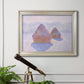 Impressionist winter haystack scene with sunlight by Claude Monet in an ornate champagne frame displayed in a light-toned interior setting.