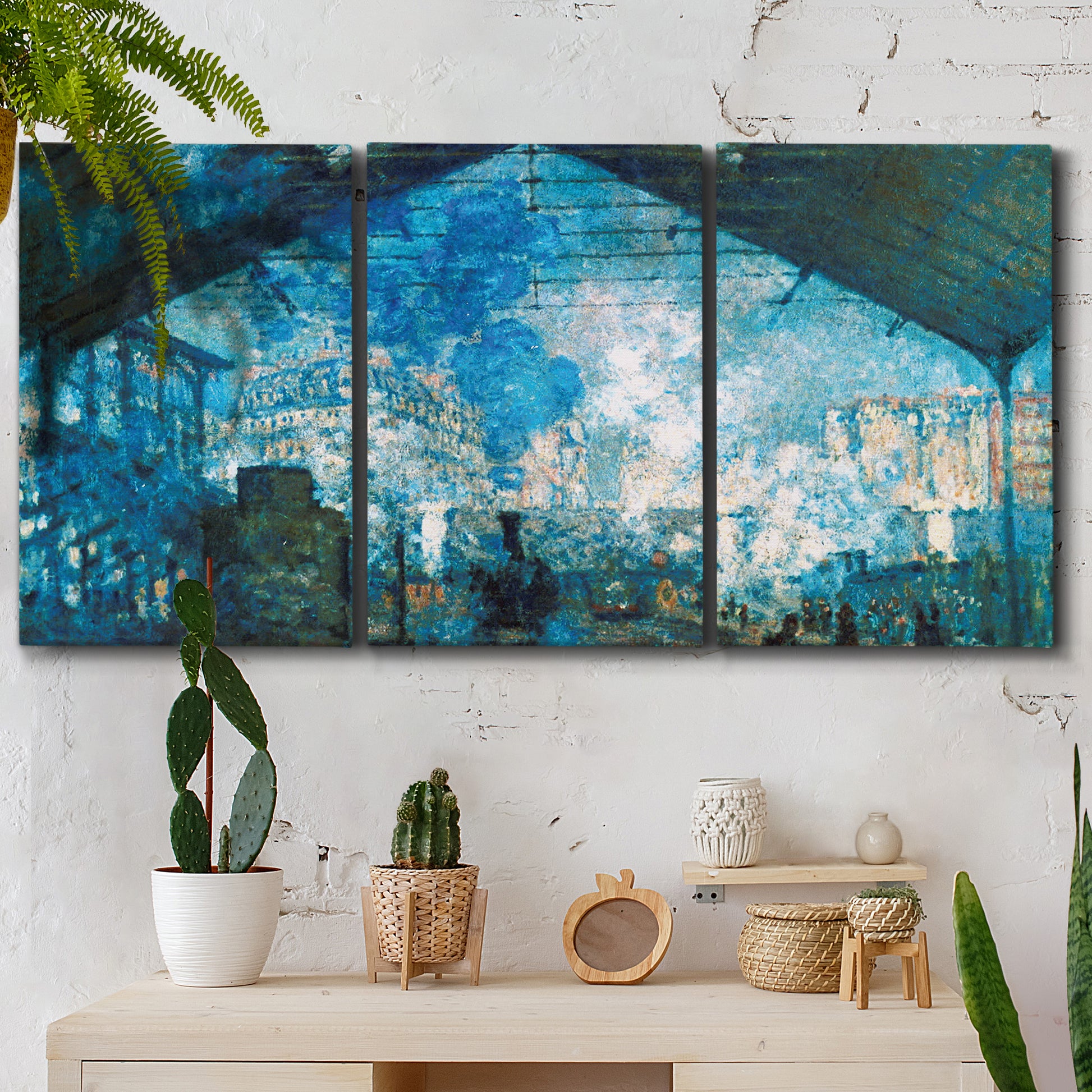 Three-panel canvas wall art featuring railway station filled with steam, displayed in a boho-chic entryway above a console table.