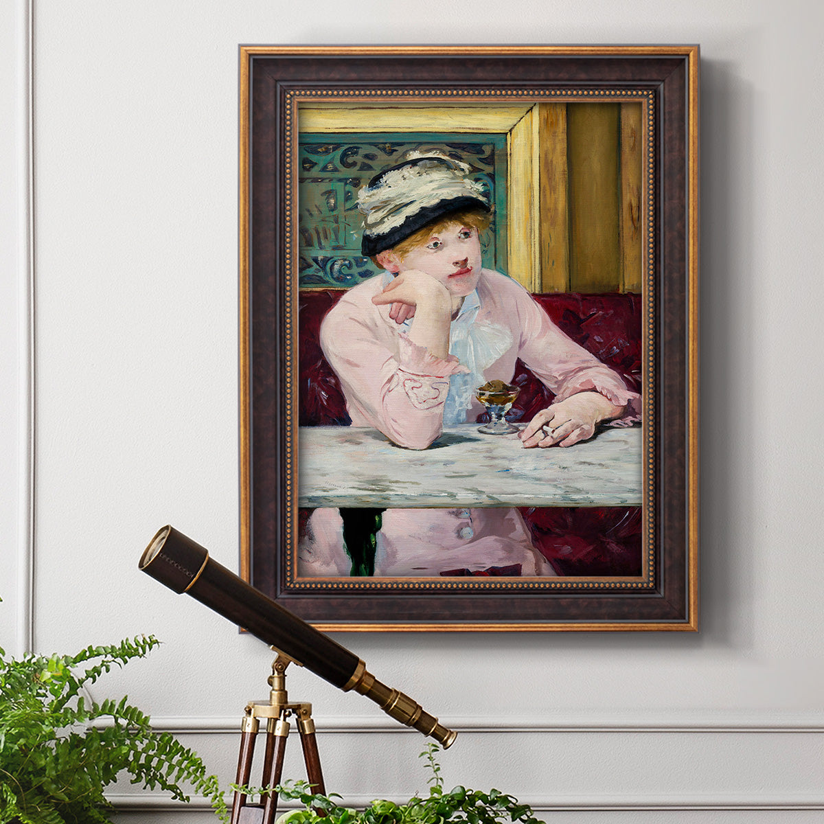 Impressionist portrait scene with plum brandy by Édouard Manet in an ornate bronzed mahogany wood frame displayed in a light-toned interior setting.
