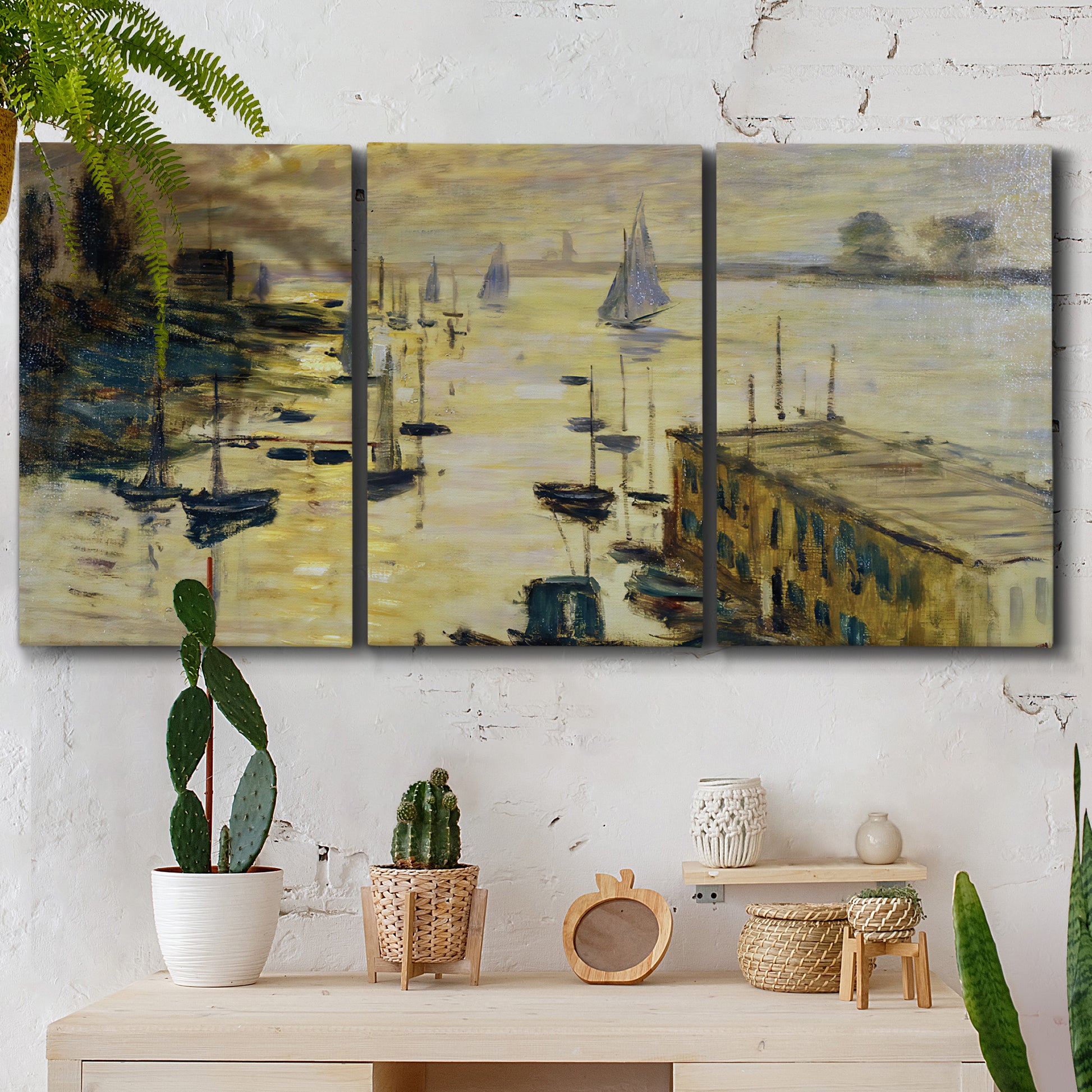 Three-panel canvas wall art featuring working harbor with boats, displayed in a boho-chic entryway above a console table.