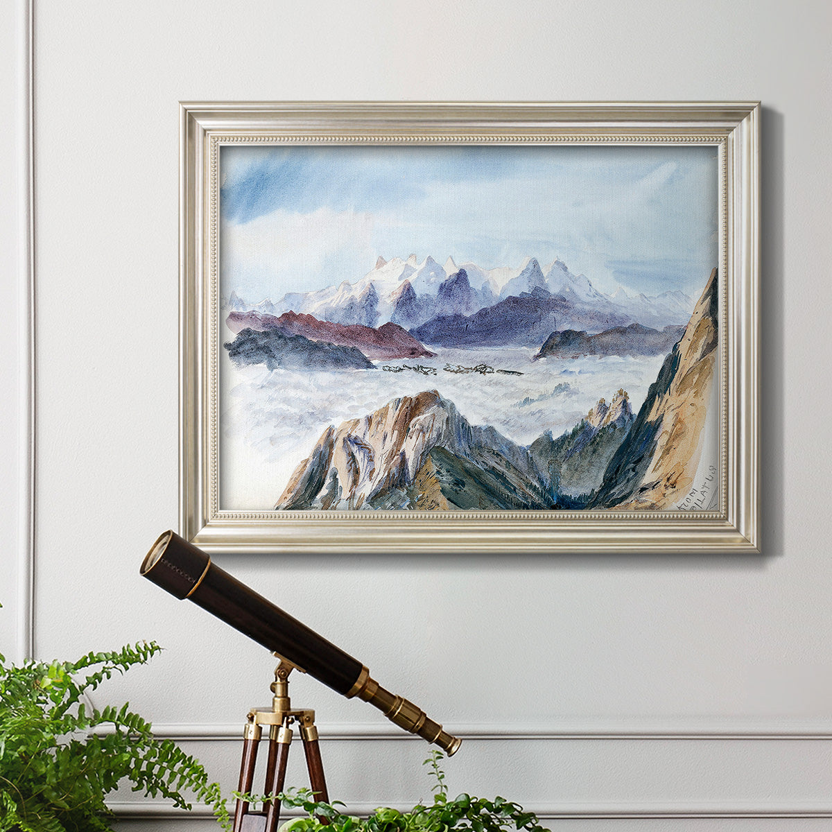Impressionist alpine mountain landscape by John Singer Sargent in an ornate champagne frame displayed in a light-toned interior setting.