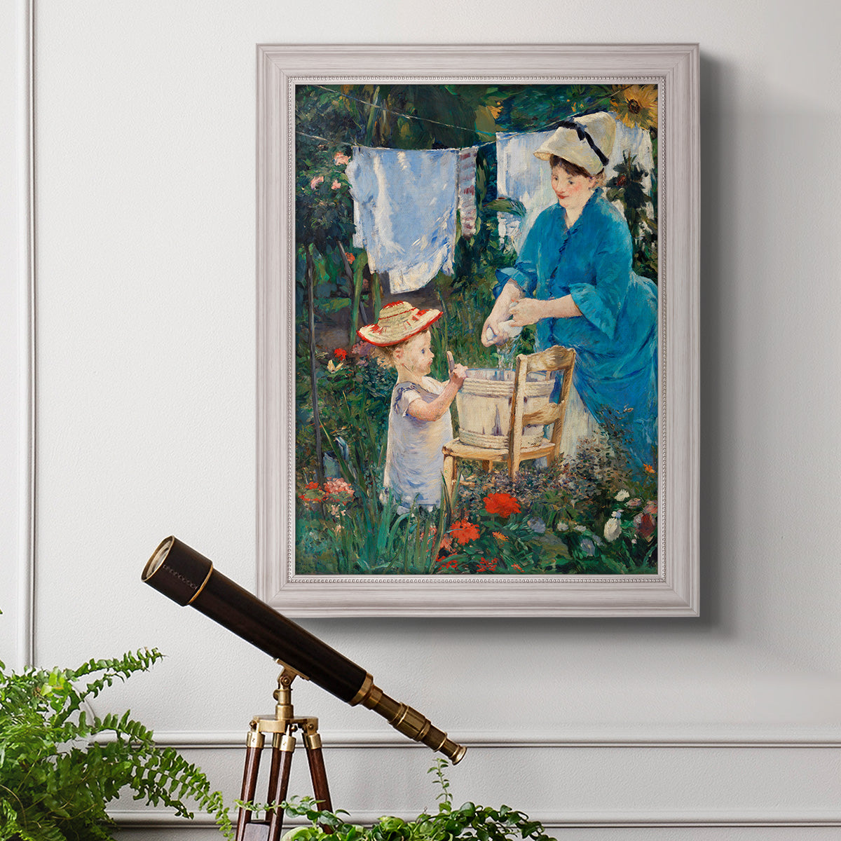 Intimate domestic genre scene by Édouard Manet in an ornate weathered white frame displayed in a light-toned interior setting.
