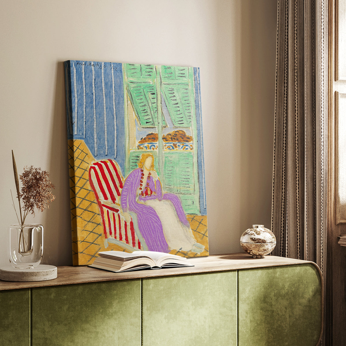 Canvas art print of a stylized figure with bold textile design and rich tones styled in a home decor setting.