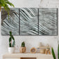 Three-panel canvas wall art featuring coastal shoreline with gentle surf, displayed in a boho-chic entryway above a console table.