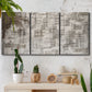 Three-panel canvas wall art featuring grid based geometric abstraction, displayed in a boho-chic entryway above a console table.