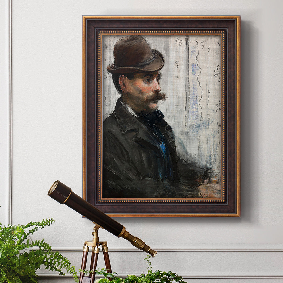 Impressionist portrait of a seated man by Édouard Manet in an ornate bronzed mahogany wood frame displayed in a light-toned interior setting.