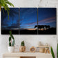 Three-panel canvas wall art featuring resting animals in open field, displayed in a boho-chic entryway above a console table.