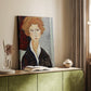 Canvas art print of a stylized portrait with simplified forms and elongated neck styled in a home decor setting.