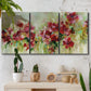 Three-panel canvas wall art featuring colorful floral garden composition, displayed in a boho-chic entryway above a console table.