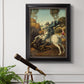 Religious painting of Saint George slaying the dragon by Raphael in an ornate black frame with gilded inner detail displayed in a light-toned interior setting.
