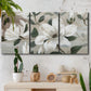 Three-panel canvas wall art featuring soft southern floral charm, displayed in a boho-chic entryway above a console table.