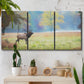 Three-panel canvas wall art featuring resting animals in open field, displayed in a boho-chic entryway above a console table.