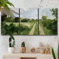Three-panel canvas wall art featuring meadow trail through open grassland, displayed in a boho-chic entryway above a console table.