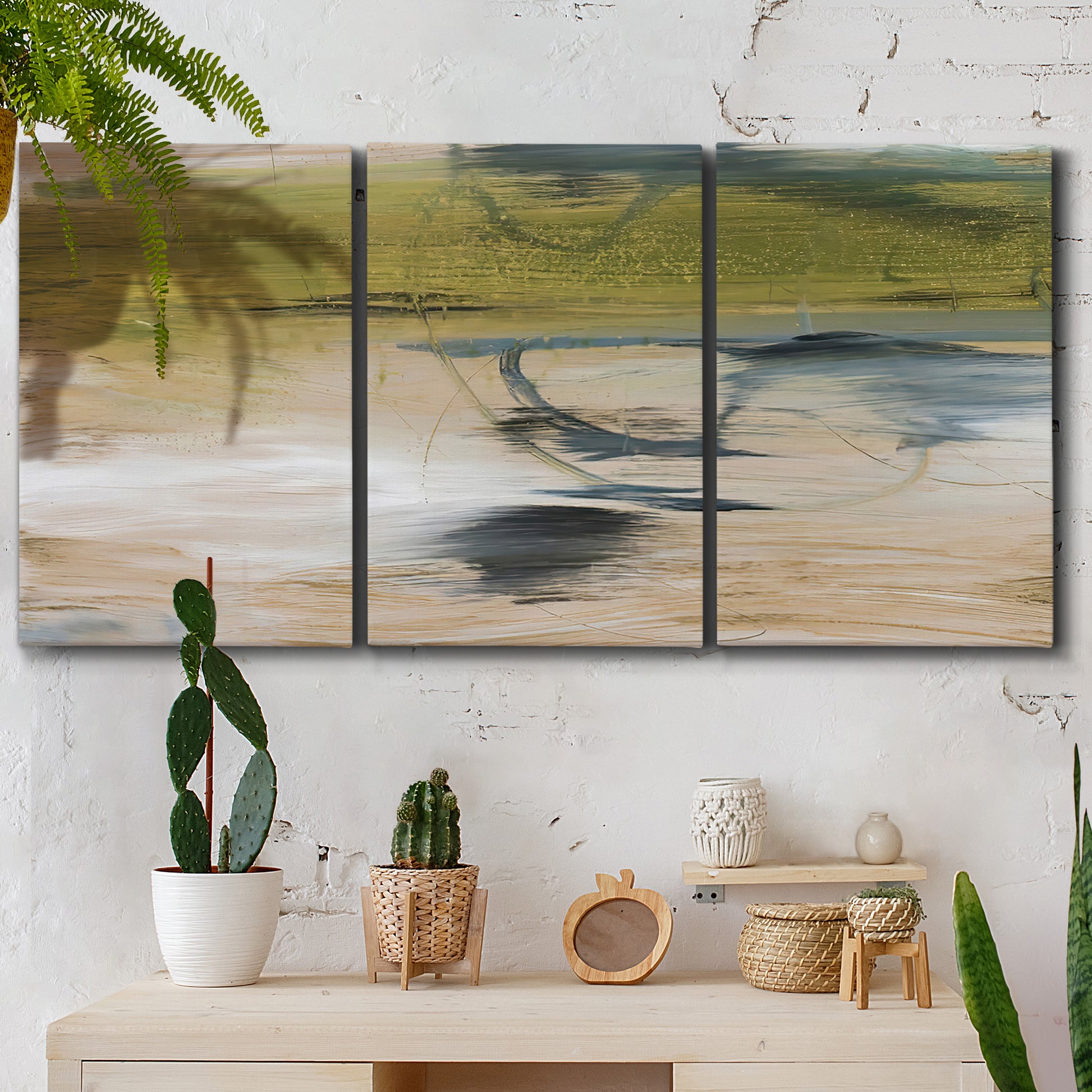 Three-panel canvas wall art featuring minimal abstract water reflections, displayed in a boho-chic entryway above a console table.