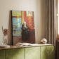 Canvas art print of a quiet scene of a woman reading in a warmly lit interior styled in a home decor setting.
